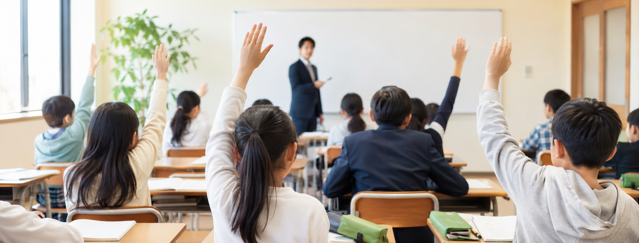 学習塾竹の子 授業風景（生徒が手を挙げる教室）